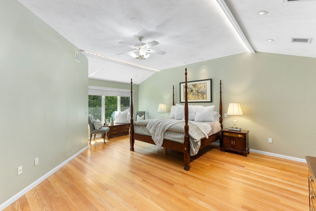 5 Linden Glen Road Canton, MA 02021 - Photo 22 of 42 a bedroom with a bed lamps and table