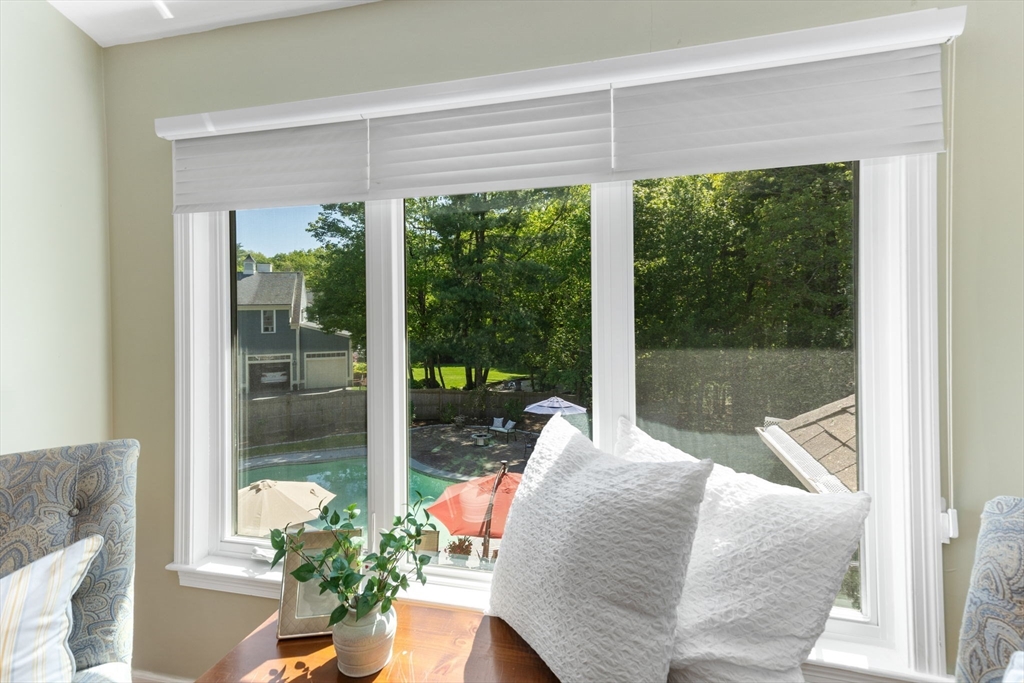 5 Linden Glen Road Canton, MA 02021 - Photo 23 of 42 a room with a bed and a potted plant