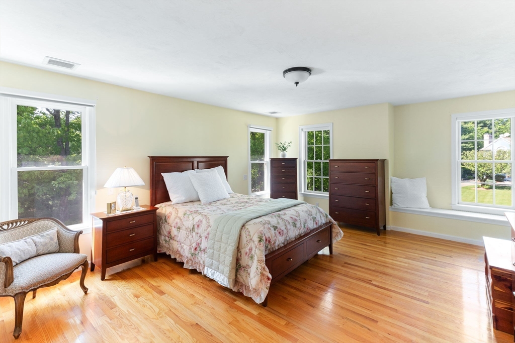 5 Linden Glen Road Canton, MA 02021 - Photo 29 of 42 a spacious bedroom with a bed and glass window