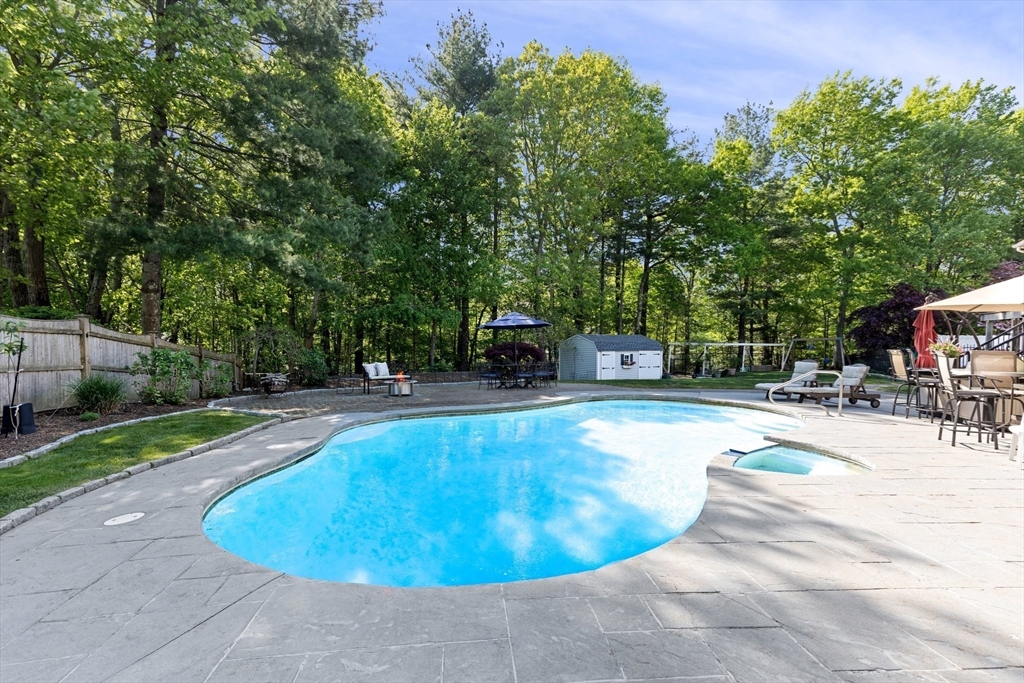 5 Linden Glen Road Canton, MA 02021 - Photo 31 of 42 a view of a swimming pool with sitting area