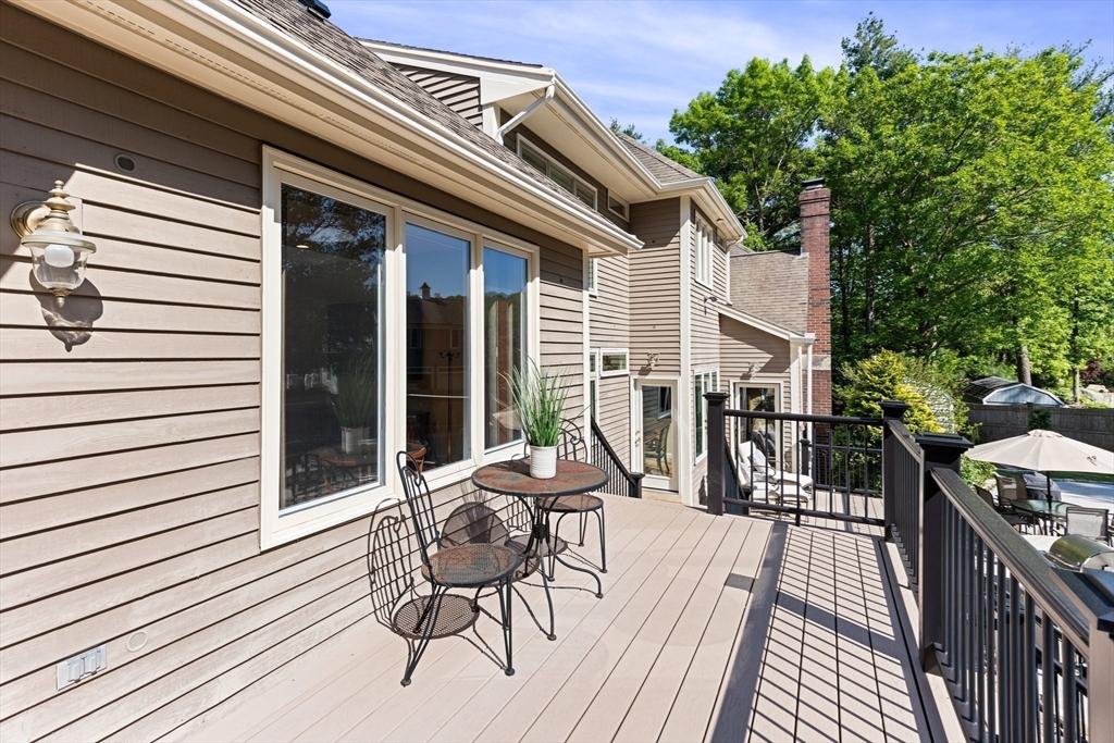 5 Linden Glen Road Canton, MA 02021 - Photo 33 of 42 a view of a patio with a table and chairs