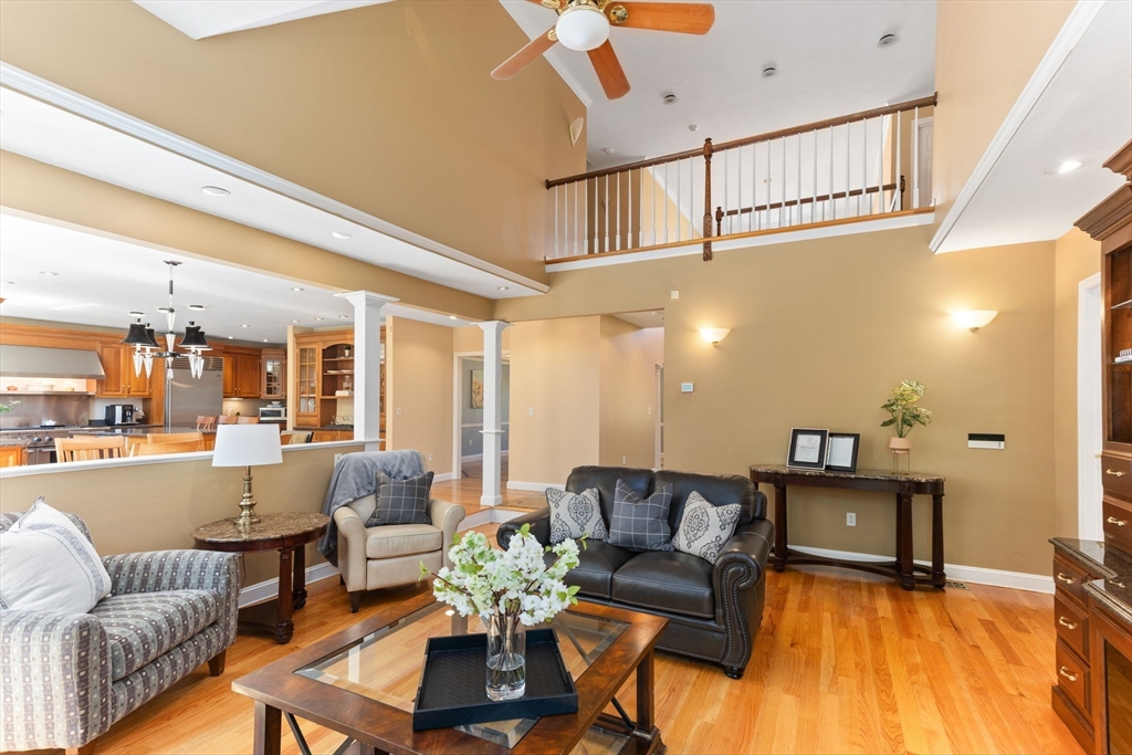 5 Linden Glen Road Canton, MA 02021 - Photo 10 of 42 a living room with furniture and kitchen view