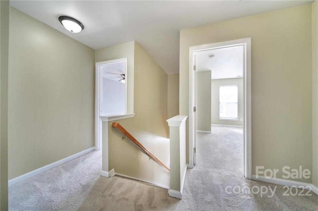 618 Bayou Circle Clover, SC 29710 - Photo 16 of 37 wooden floor with closet and mirror