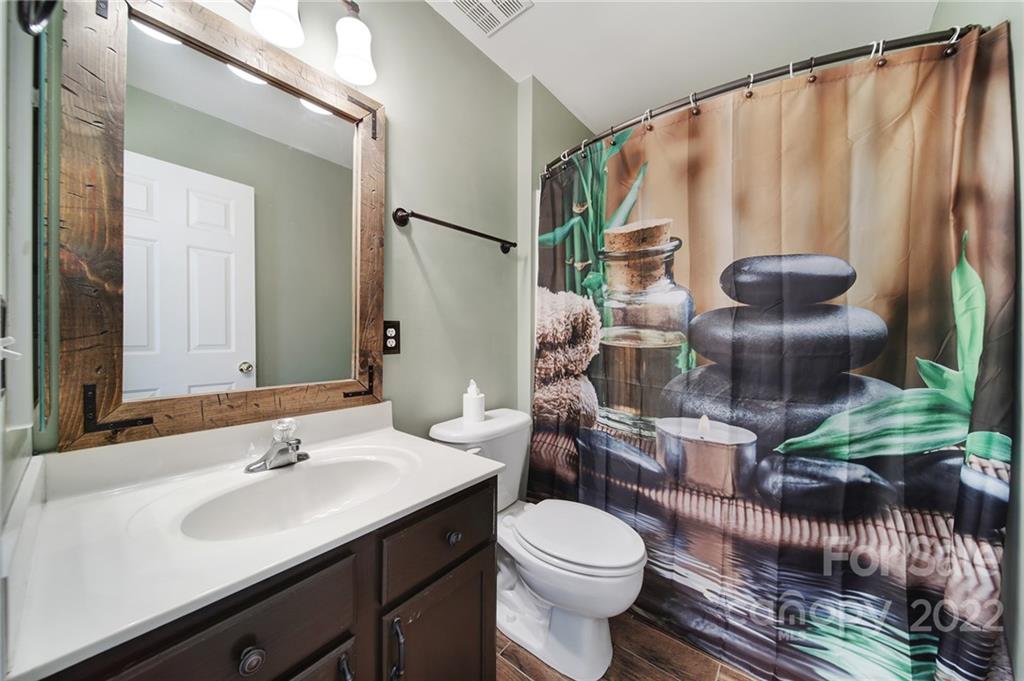 618 Bayou Circle Clover, SC 29710 - Photo 21 of 37 a bathroom with a sink a toilet and shower