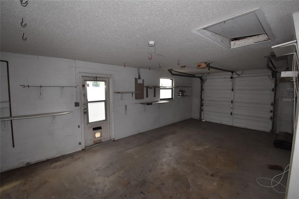 7615 Karen Drive Port Richey, FL 34668 - Photo 22 of 24 a view of empty room with windows