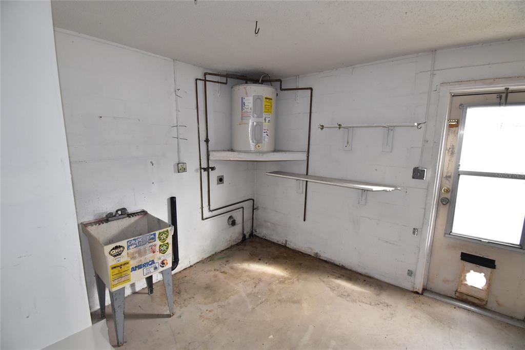7615 Karen Drive Port Richey, FL 34668 - Photo 23 of 24 a view of utility room