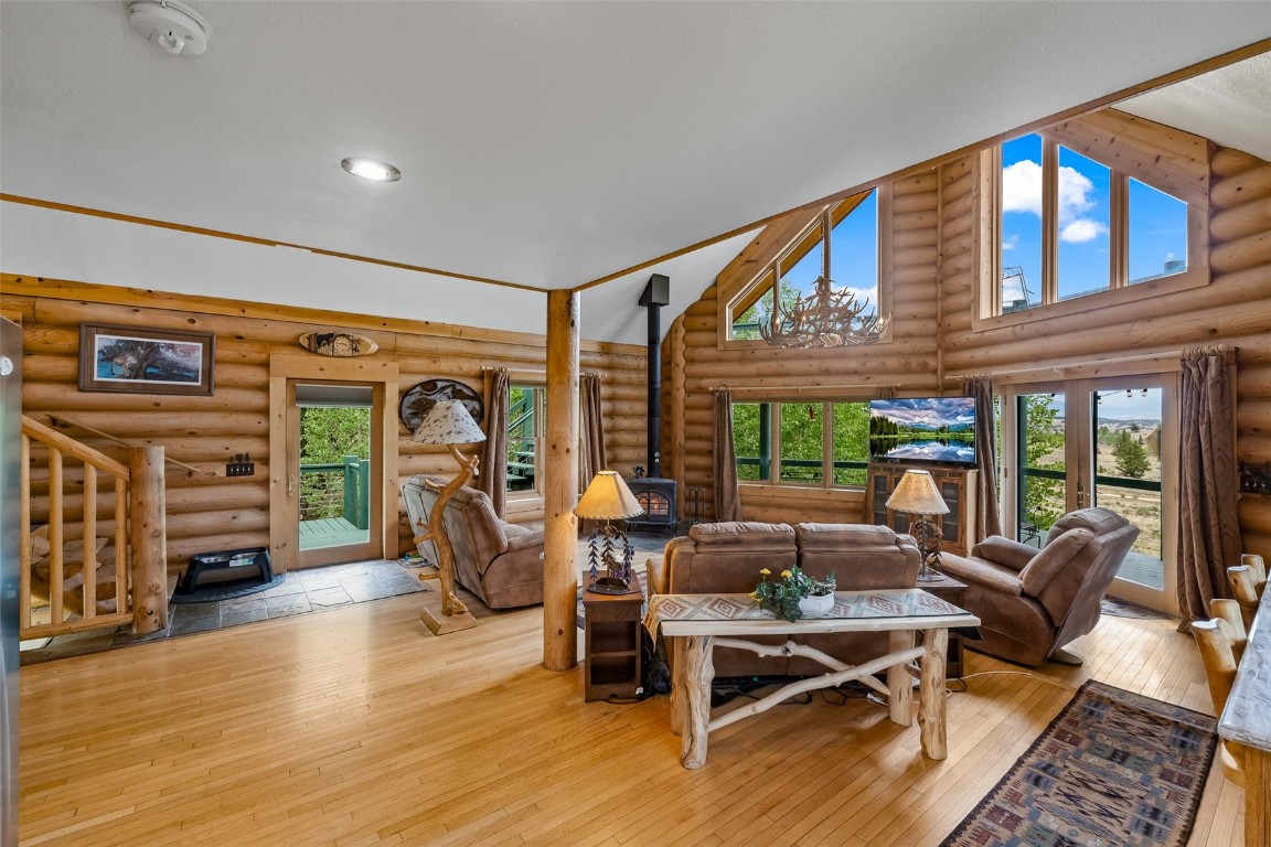 486-432 Turk Pony Way Como, CO 80456 - Photo 11 of 49 a living room with fireplace furniture and a large window