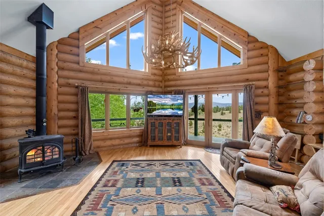 a living room with furniture and a rug