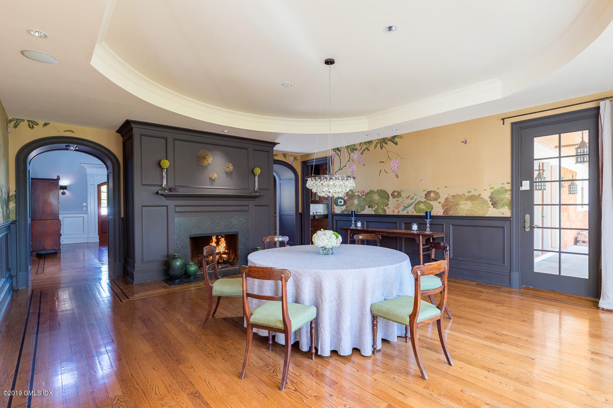 170 Old Mill Road Greenwich, CT 06831 - Photo 12 of 42 a view of a dining room with furniture window and wooden floor