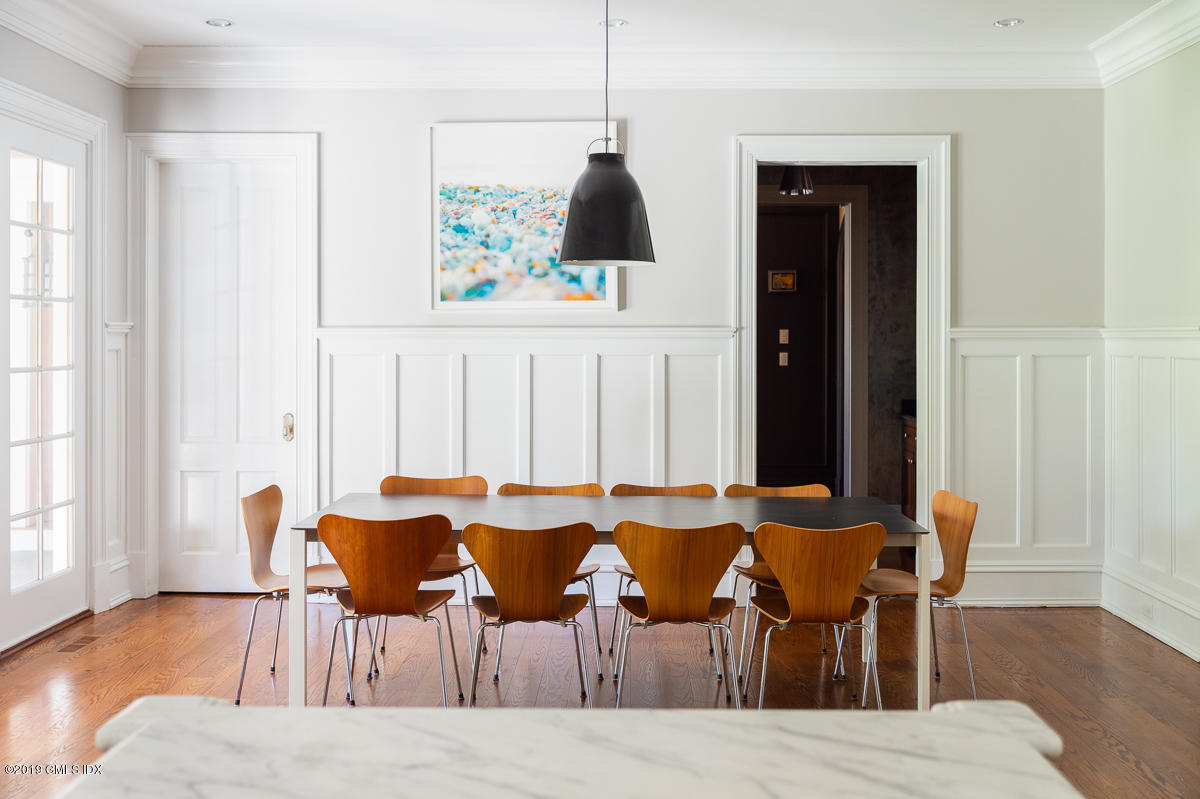 170 Old Mill Road Greenwich, CT 06831 - Photo 14 of 42 a view of a dining room with furniture and wooden floor