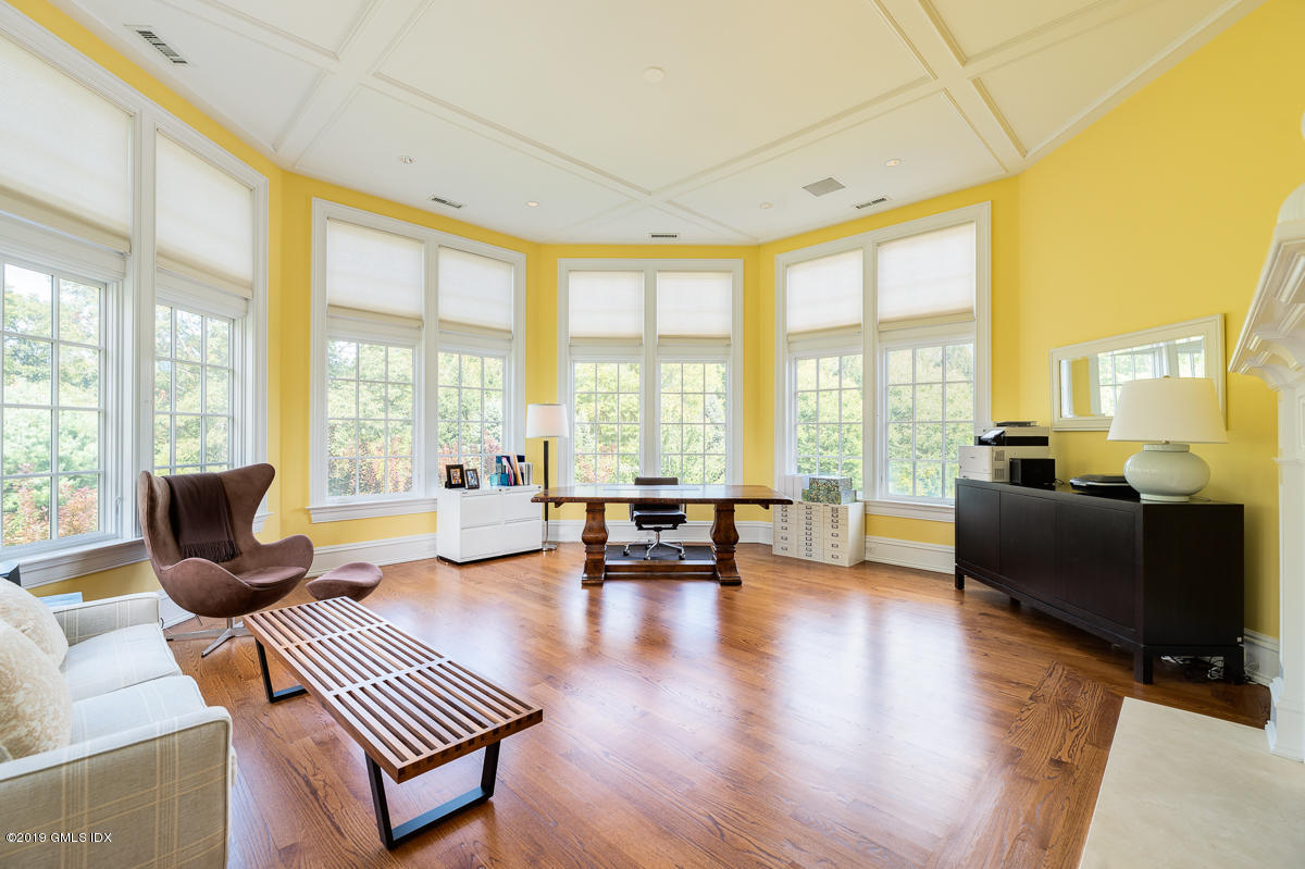 170 Old Mill Road Greenwich, CT 06831 - Photo 24 of 42 a living room with furniture and a large window