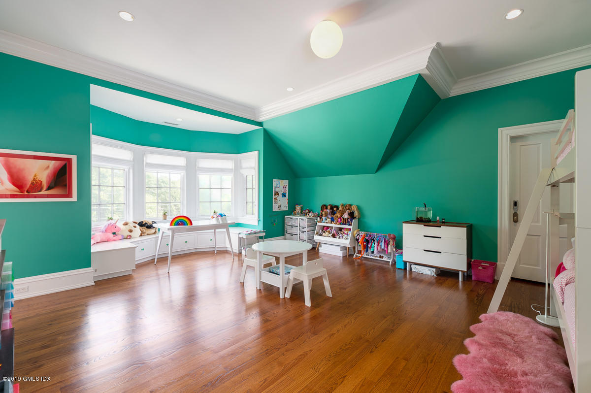 170 Old Mill Road Greenwich, CT 06831 - Photo 27 of 42 a living room with furniture and a wooden floor