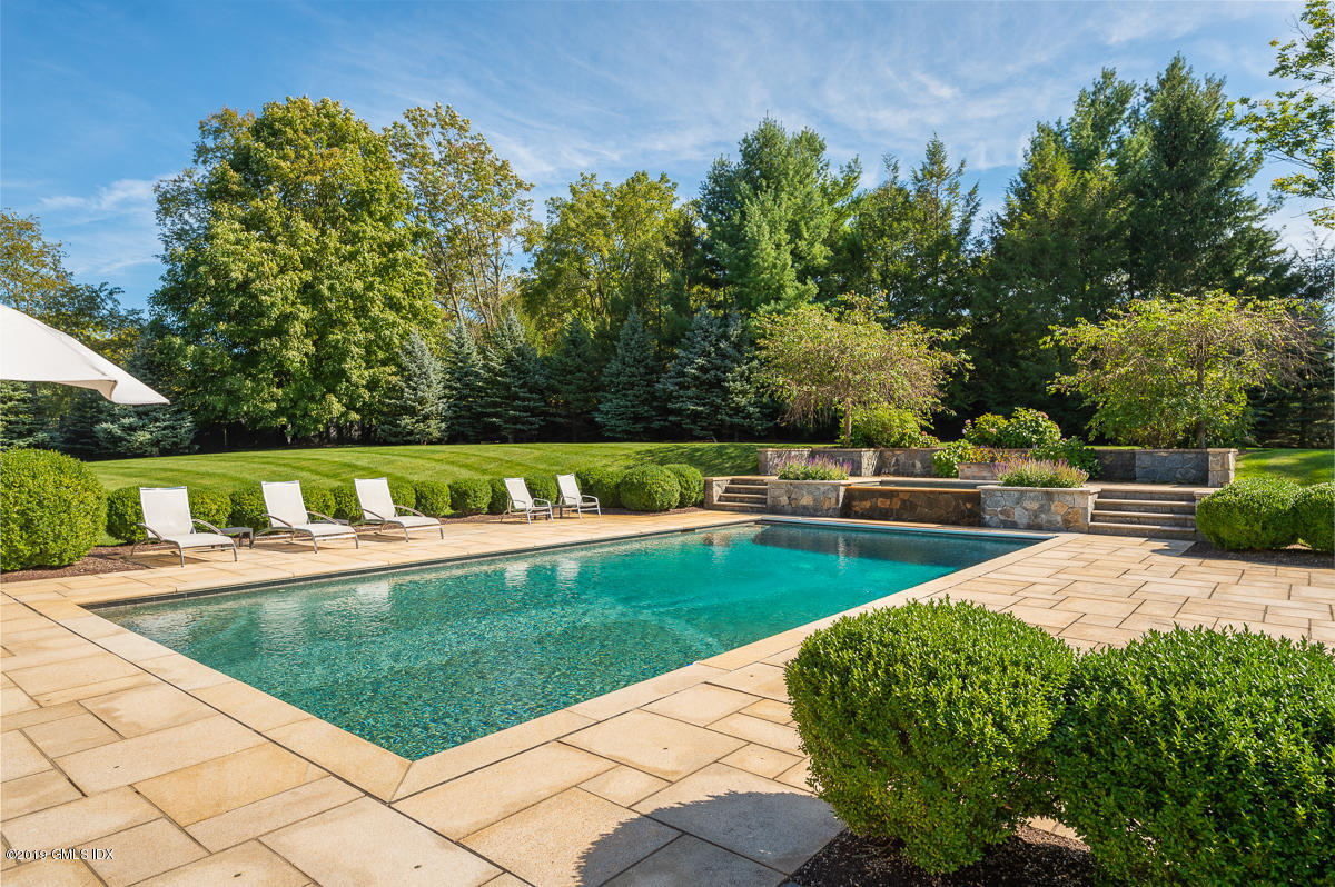 170 Old Mill Road Greenwich, CT 06831 - Photo 35 of 42 a view of a backyard with swimming pool