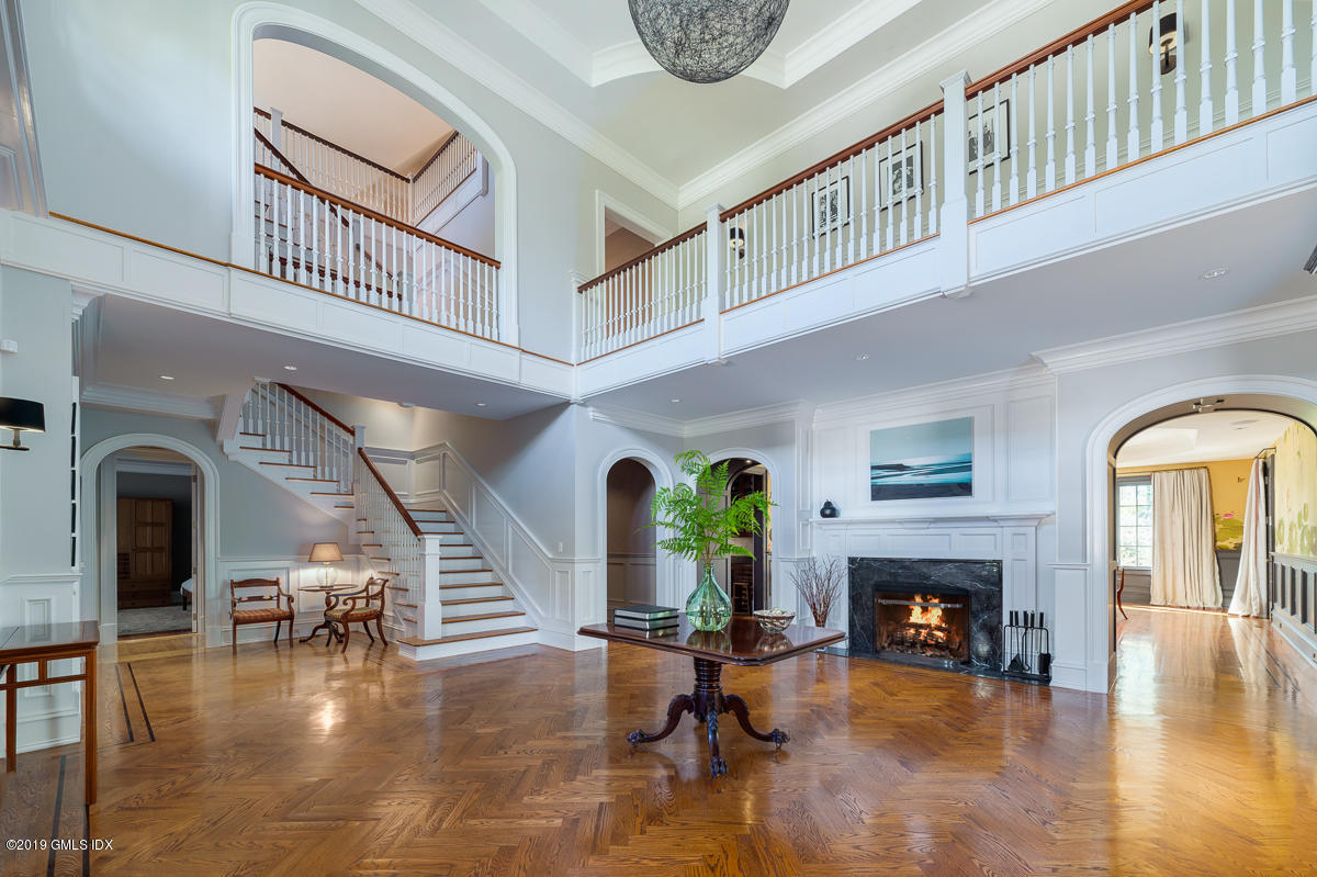 170 Old Mill Road Greenwich, CT 06831 - Photo 6 of 42 a view of livingroom with fireplace and wooden floor