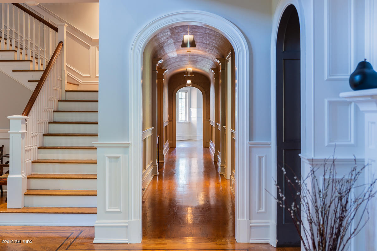 170 Old Mill Road Greenwich, CT 06831 - Photo 7 of 42 a view of a entryway door with a living room