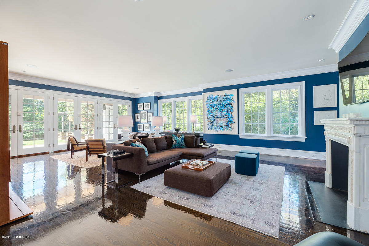 170 Old Mill Road Greenwich, CT 06831 - Photo 8 of 42 a living room with furniture and a large window