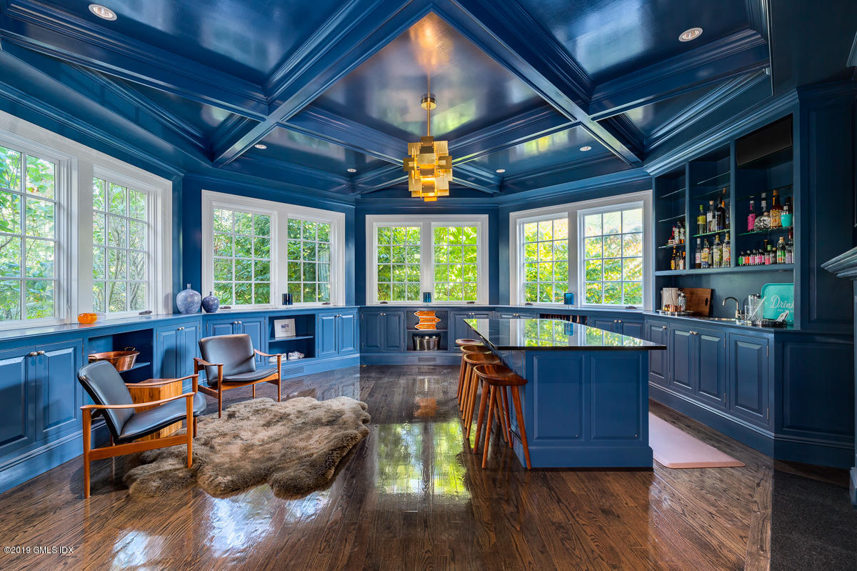 170 Old Mill Road Greenwich, CT 06831 - Photo 10 of 42 a living room with furniture and a large window
