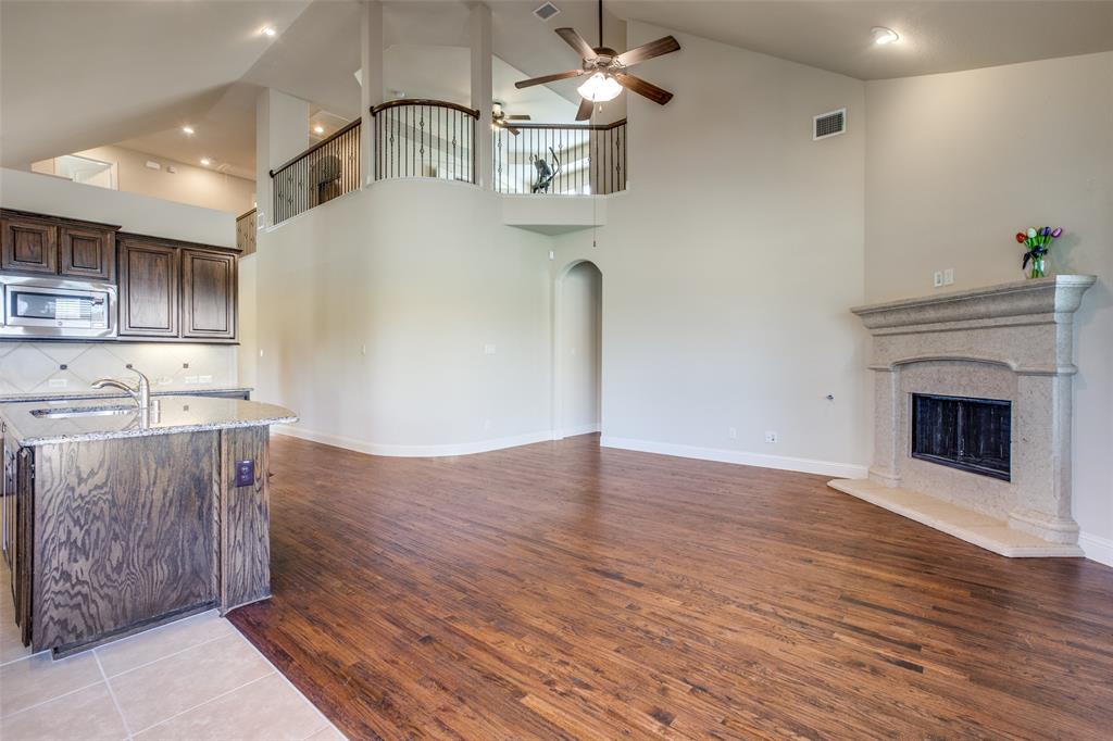 503 Hemlock Court Wylie, TX 75098 - Photo 11 of 35 a view of kitchen with cabinets and wooden floor