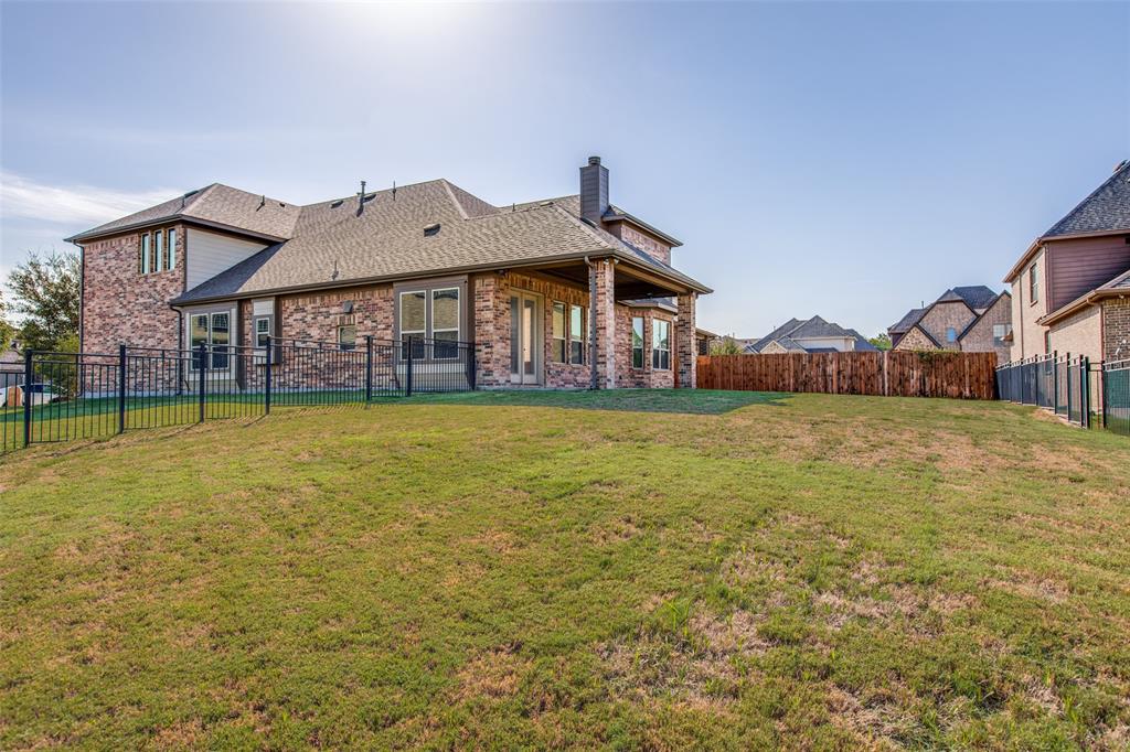 503 Hemlock Court Wylie, TX 75098 - Photo 32 of 35 a view of a house with a big yard and large trees
