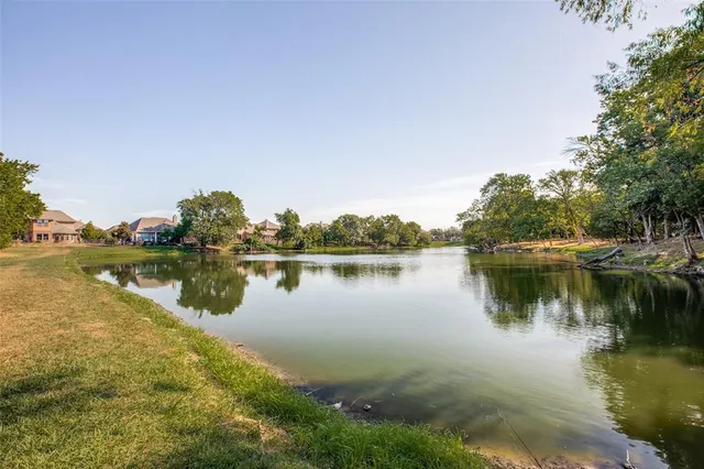 a view of a lake with a city