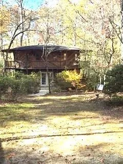a view of a house with a ocean view