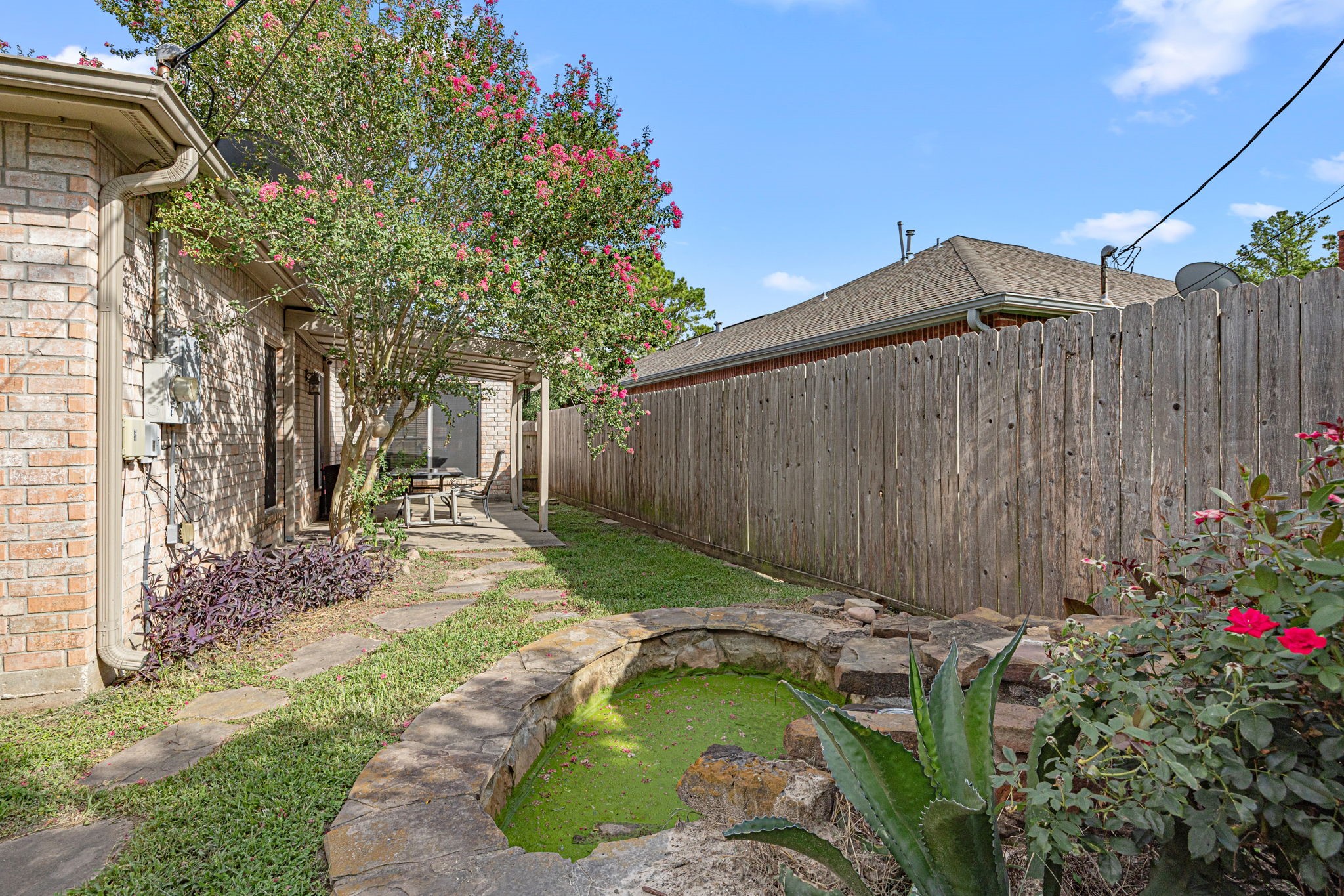 7202 North Fawn River Circle Spring, TX 77379 - Photo 22 of 22 a backyard of a house with lots of green space