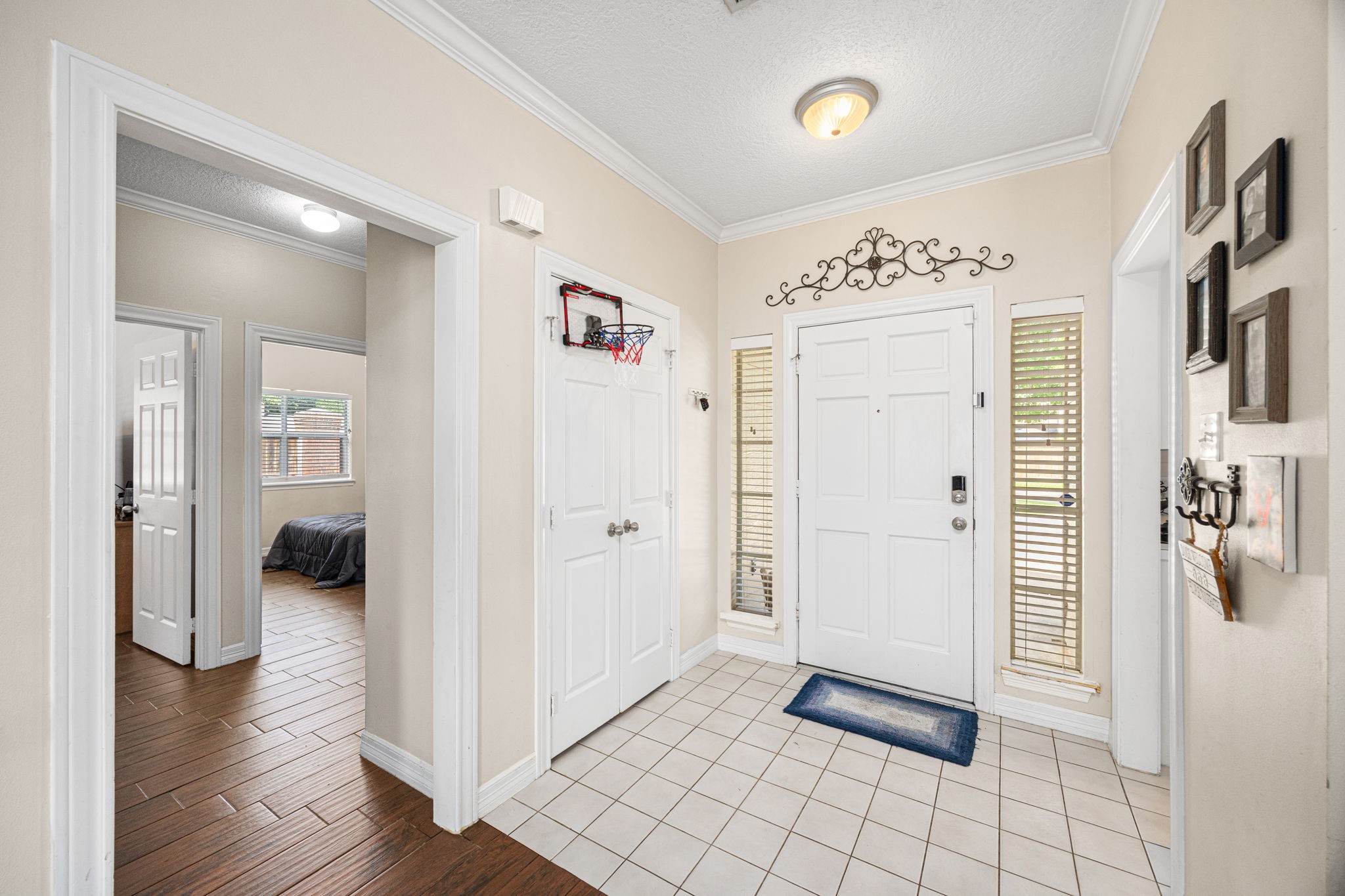7202 North Fawn River Circle Spring, TX 77379 - Photo 4 of 22 a view of a hallway with wooden floor and closet