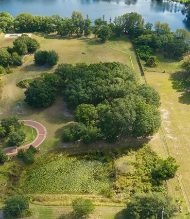a view of a lake with a yard