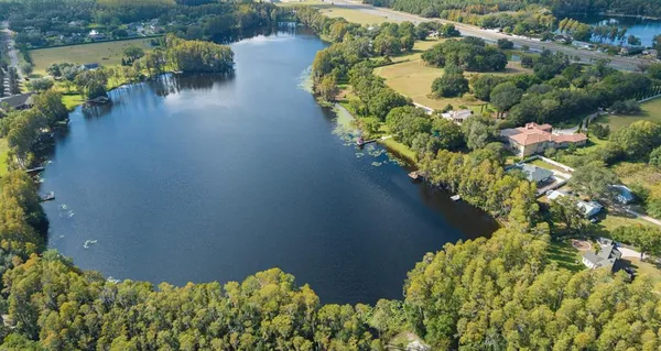 a view of a lake with a park