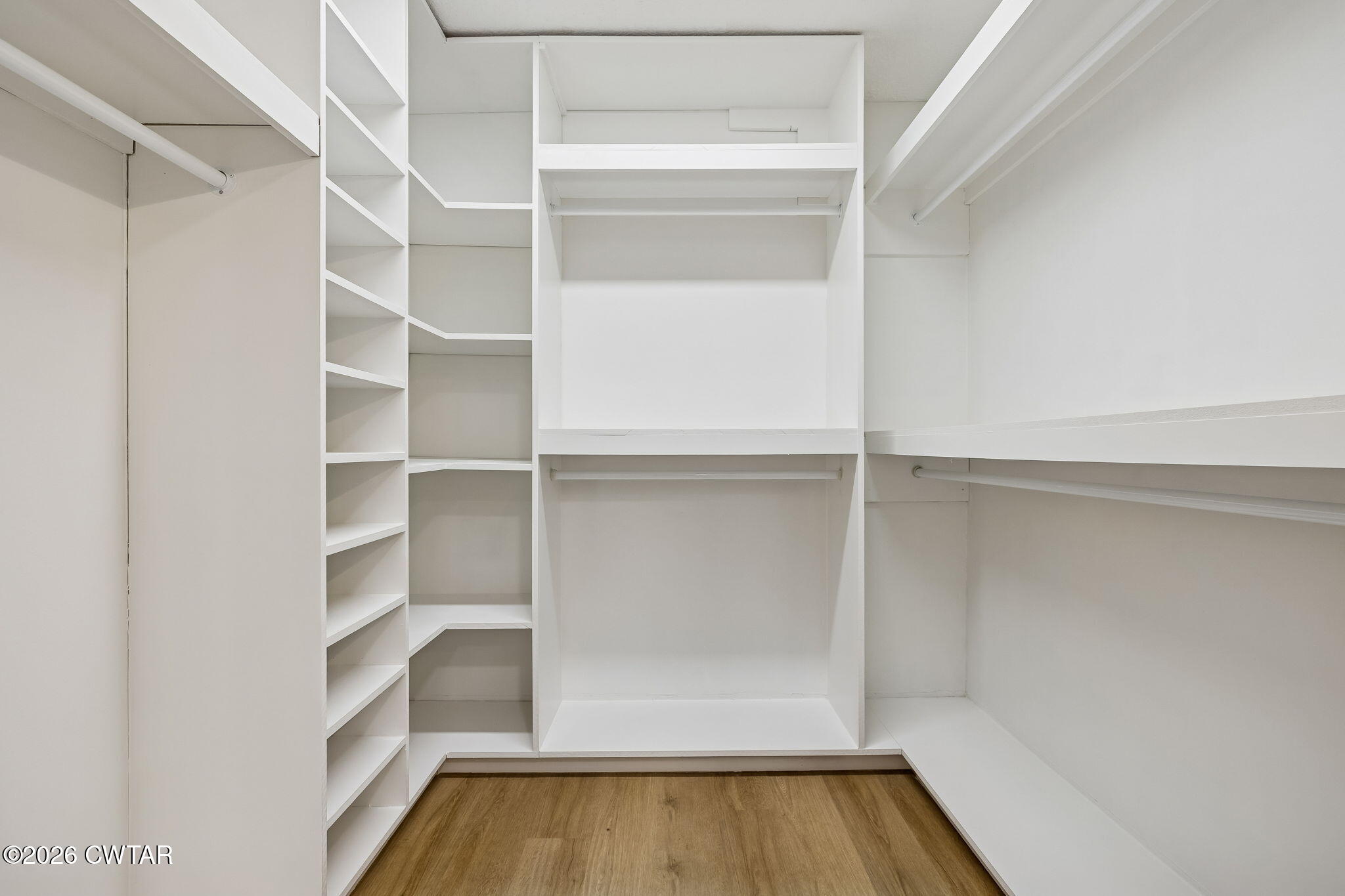 123 Walnut Hill Road Bells, TN 38006 - Photo 32 of 61 a view of walk in closet with empty racks