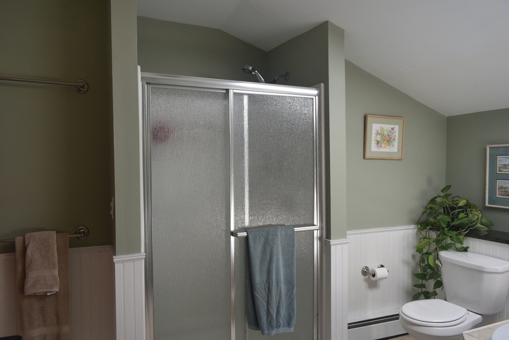 111 Northwest Road Spencer, MA 01562 - Photo 12 of 34 a bathroom with a toilet and a shower