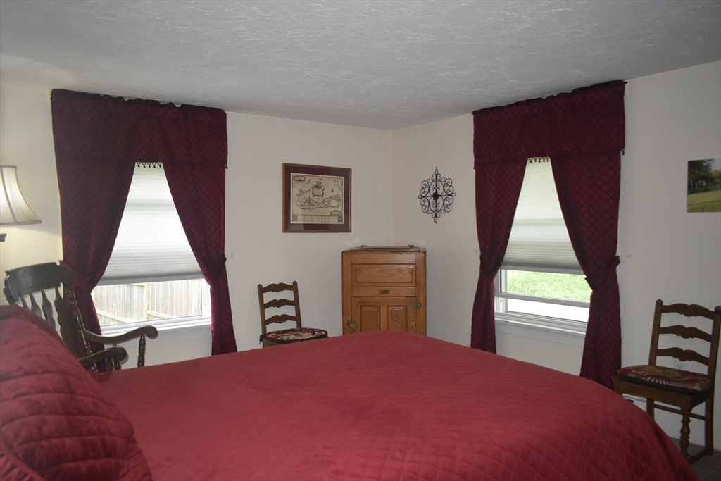 111 Northwest Road Spencer, MA 01562 - Photo 12 of 23 a bedroom with a bed and a window