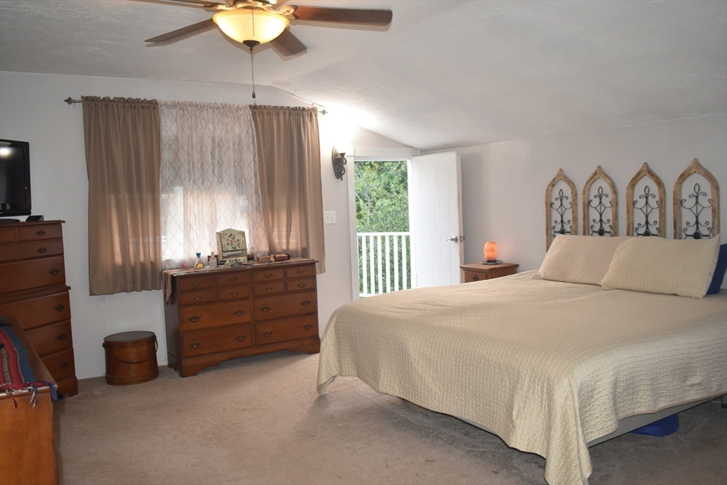 111 Northwest Road Spencer, MA 01562 - Photo 13 of 34 a bedroom with a bed dresser and a window