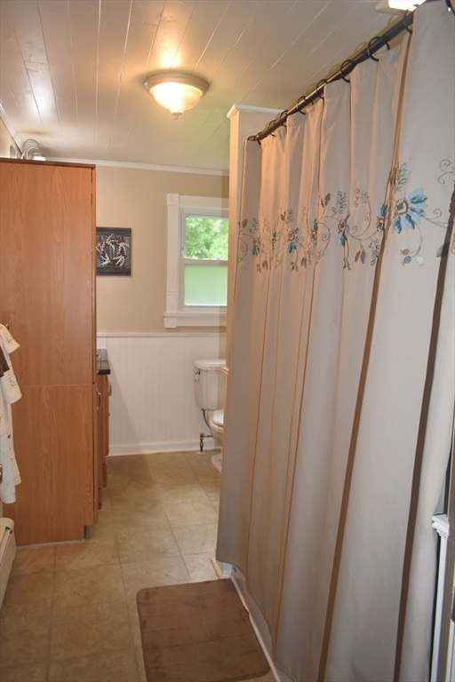 111 Northwest Road Spencer, MA 01562 - Photo 15 of 34 a bathroom with a shower and a tub
