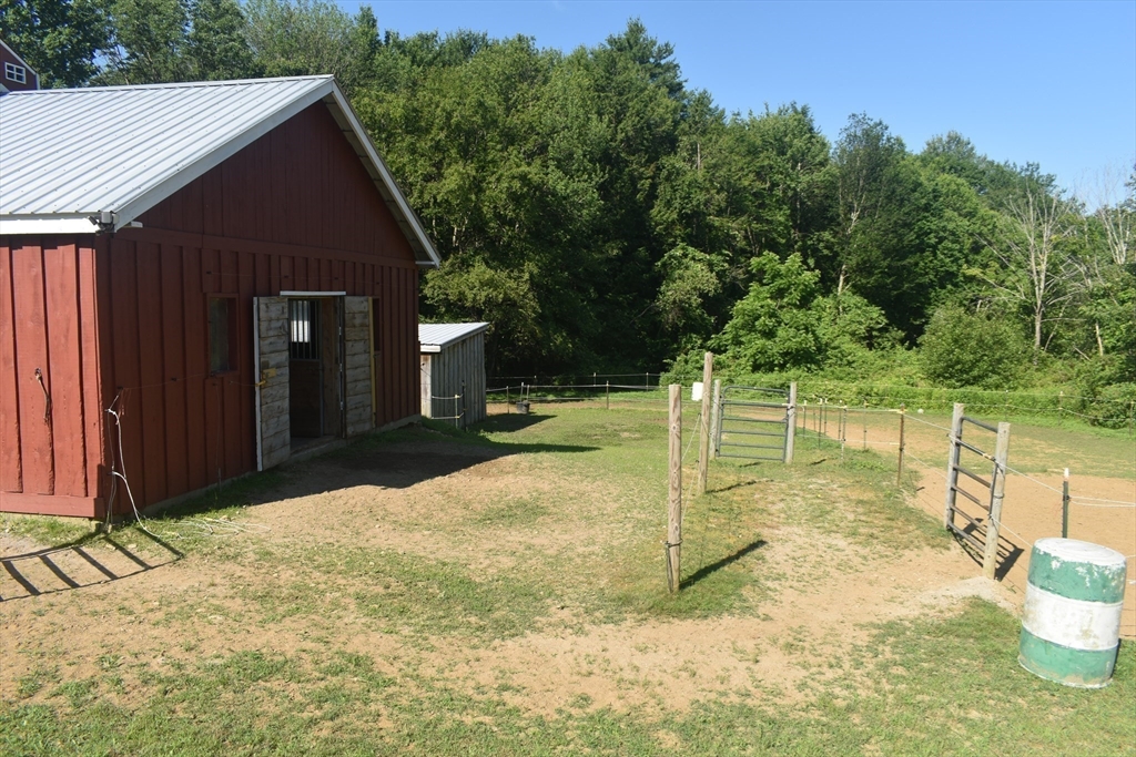 111 Northwest Road Spencer, MA 01562 - Photo 17 of 23 a backyard of a house with lots of green space
