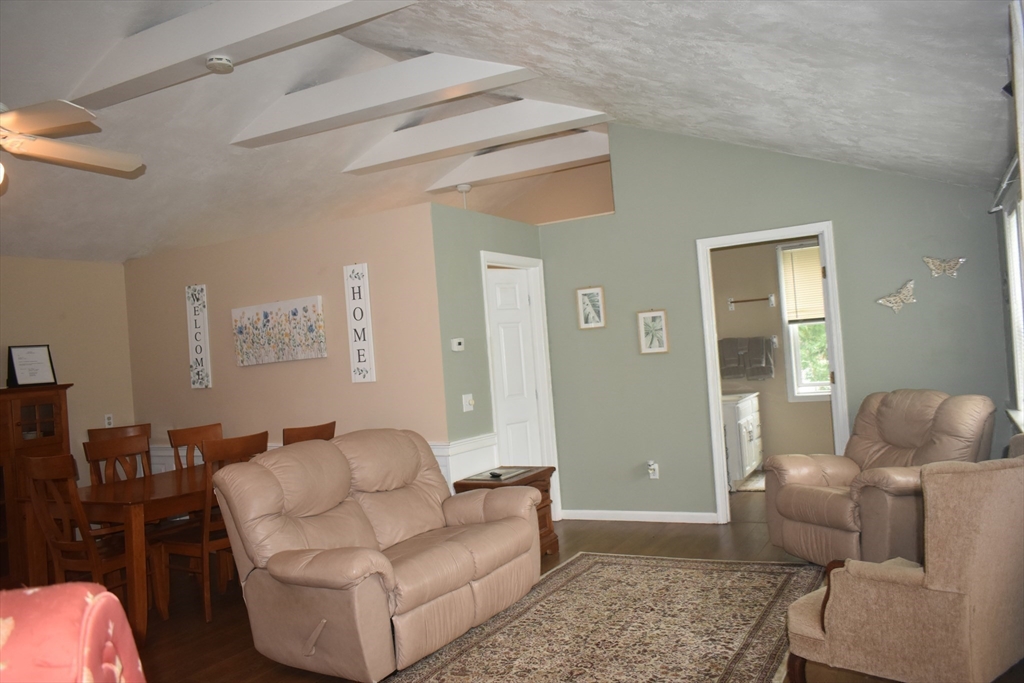 111 Northwest Road Spencer, MA 01562 - Photo 19 of 34 a living room with furniture and a window