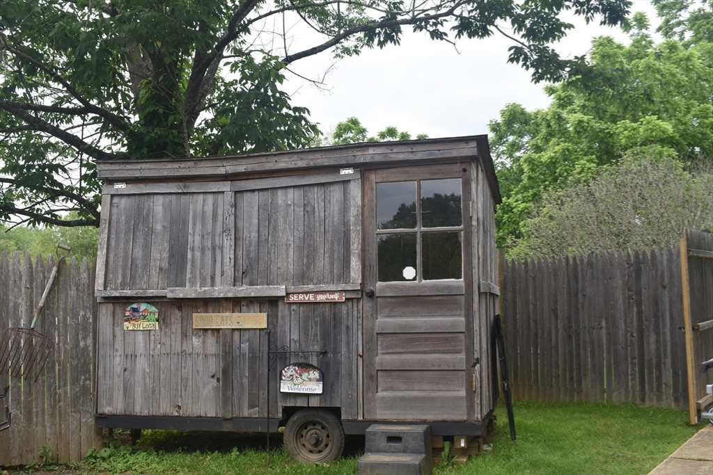 111 Northwest Road Spencer, MA 01562 - Photo 20 of 23 a view of a house with a backyard