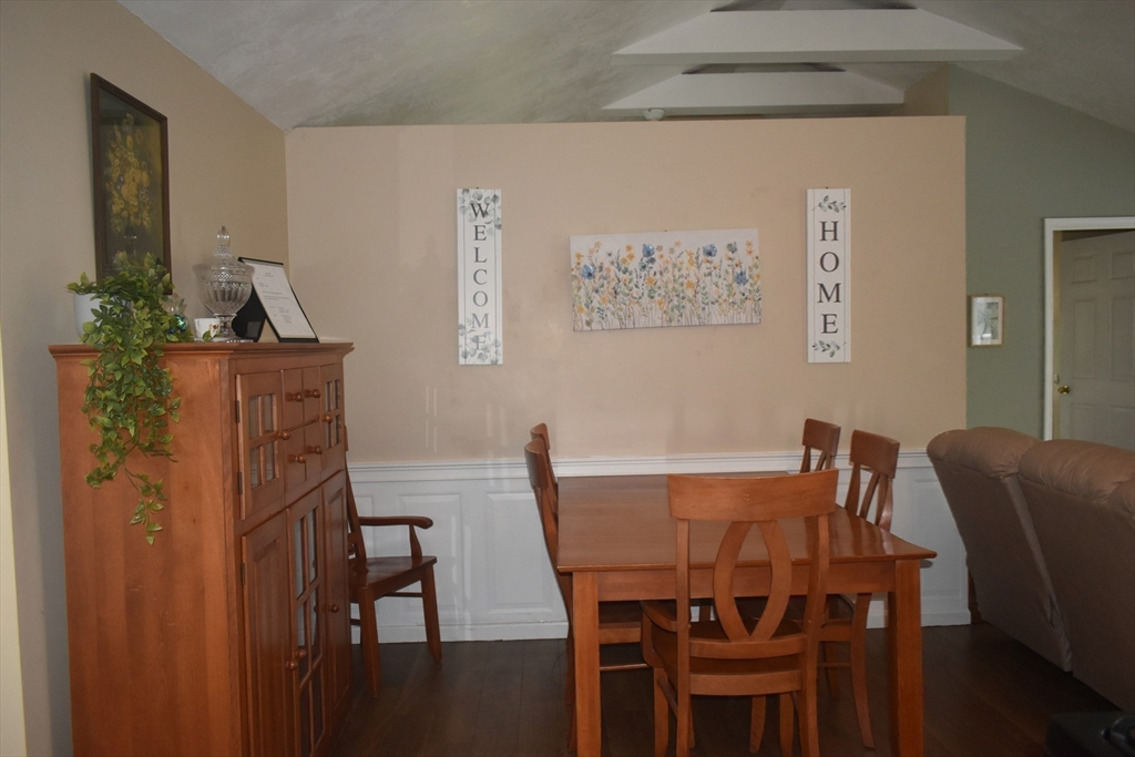 111 Northwest Road Spencer, MA 01562 - Photo 22 of 34 a view of a dining room with furniture and wooden floor