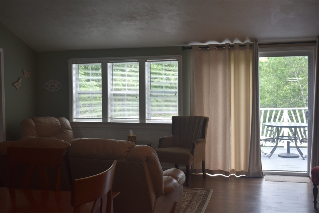 111 Northwest Road Spencer, MA 01562 - Photo 23 of 34 a living room with furniture and a large window