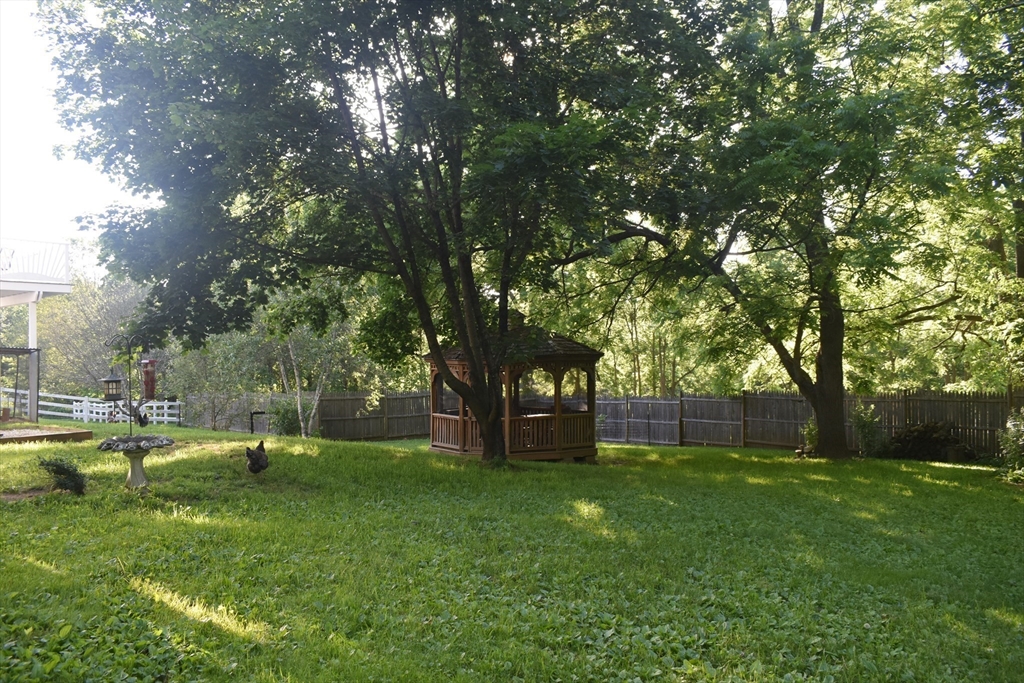 111 Northwest Road Spencer, MA 01562 - Photo 30 of 34 a garden view with a fountain