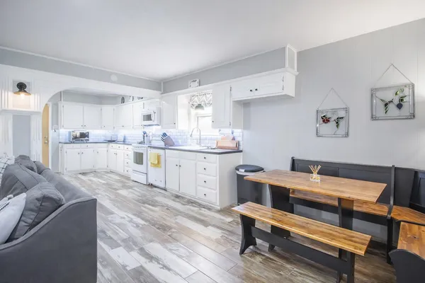 a bedroom with a bed and a table in it