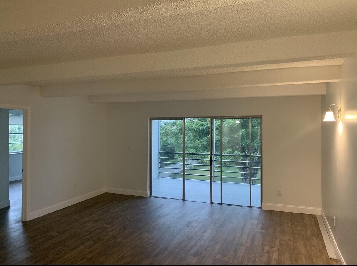 10120 Boca Entrada Boulevard, Unit 307 Boca Raton, FL 33428 - Photo 6 of 26 LIVING ROOM