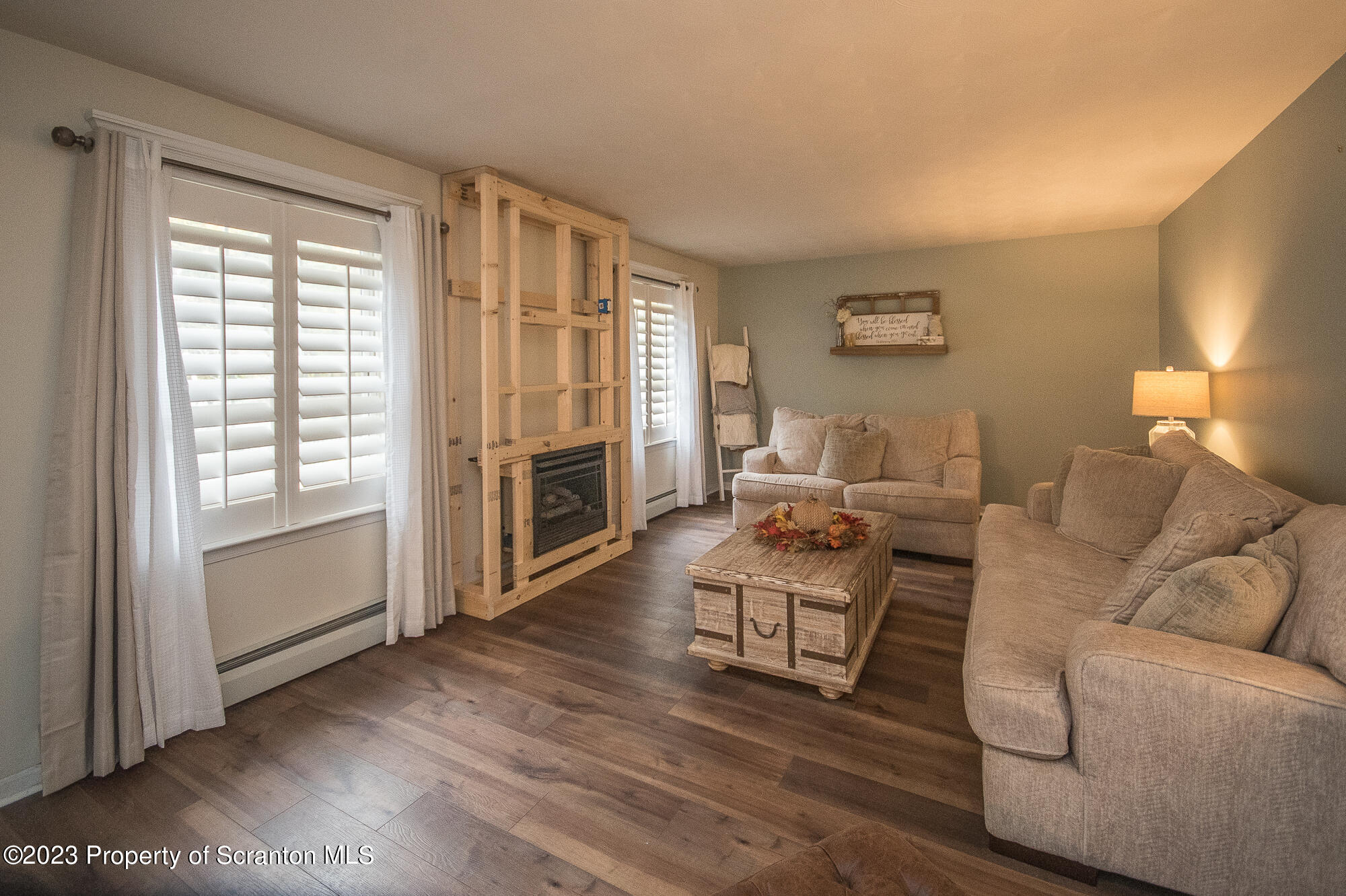 34 Blackberry Hill Road Moscow, PA 18444 - Photo 20 of 43 a living room with furniture and a wooden floor