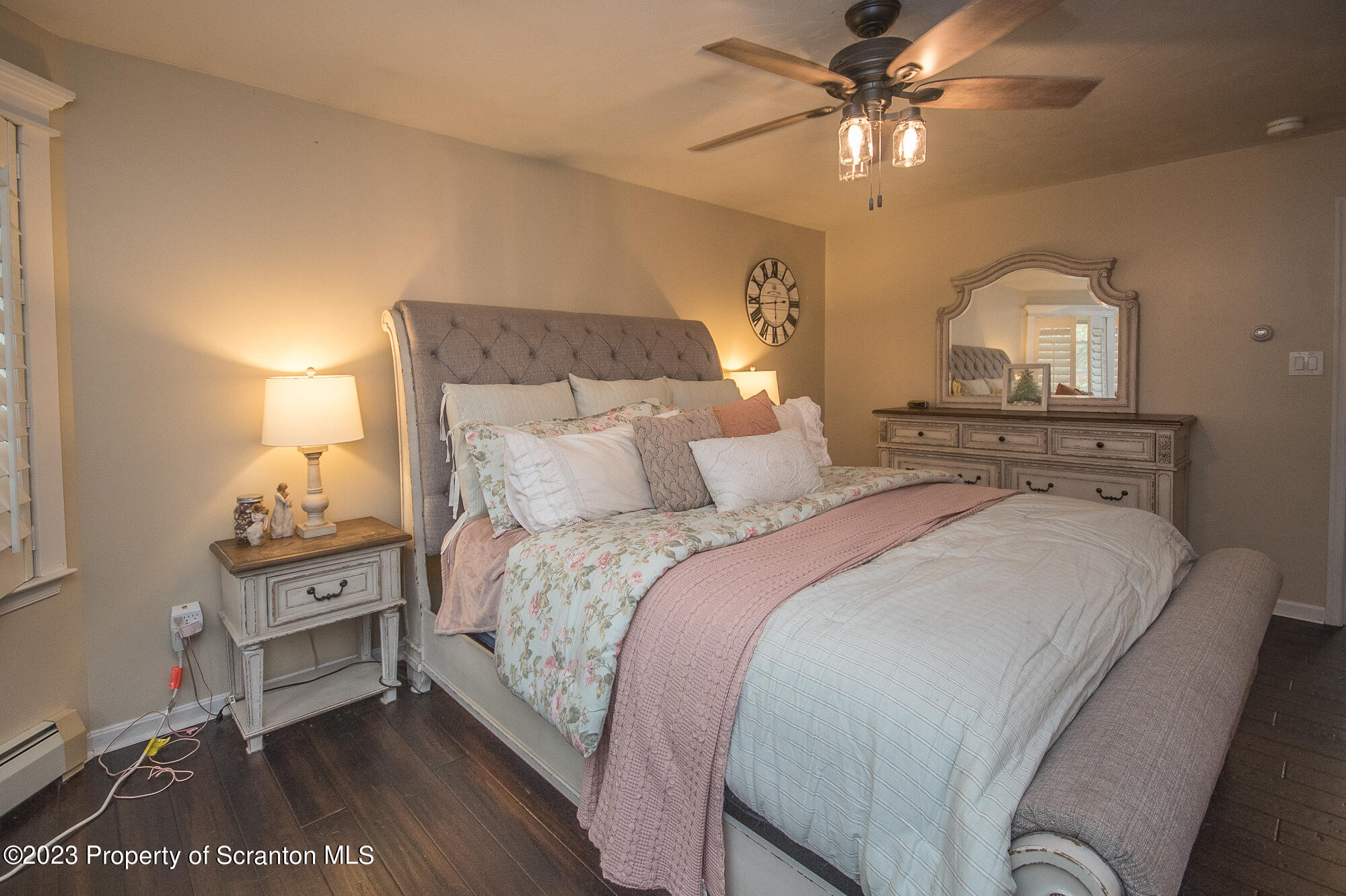 34 Blackberry Hill Road Moscow, PA 18444 - Photo 25 of 43 a bedroom with a bed and a chandelier