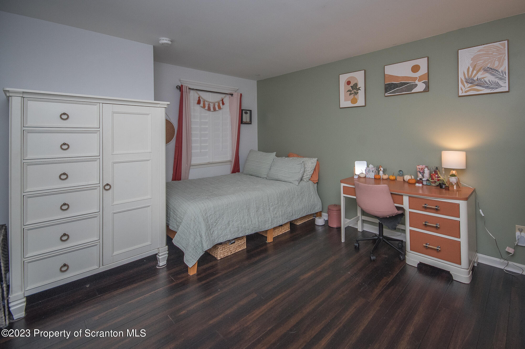 34 Blackberry Hill Road Moscow, PA 18444 - Photo 34 of 43 a bedroom with a bed and a table in it