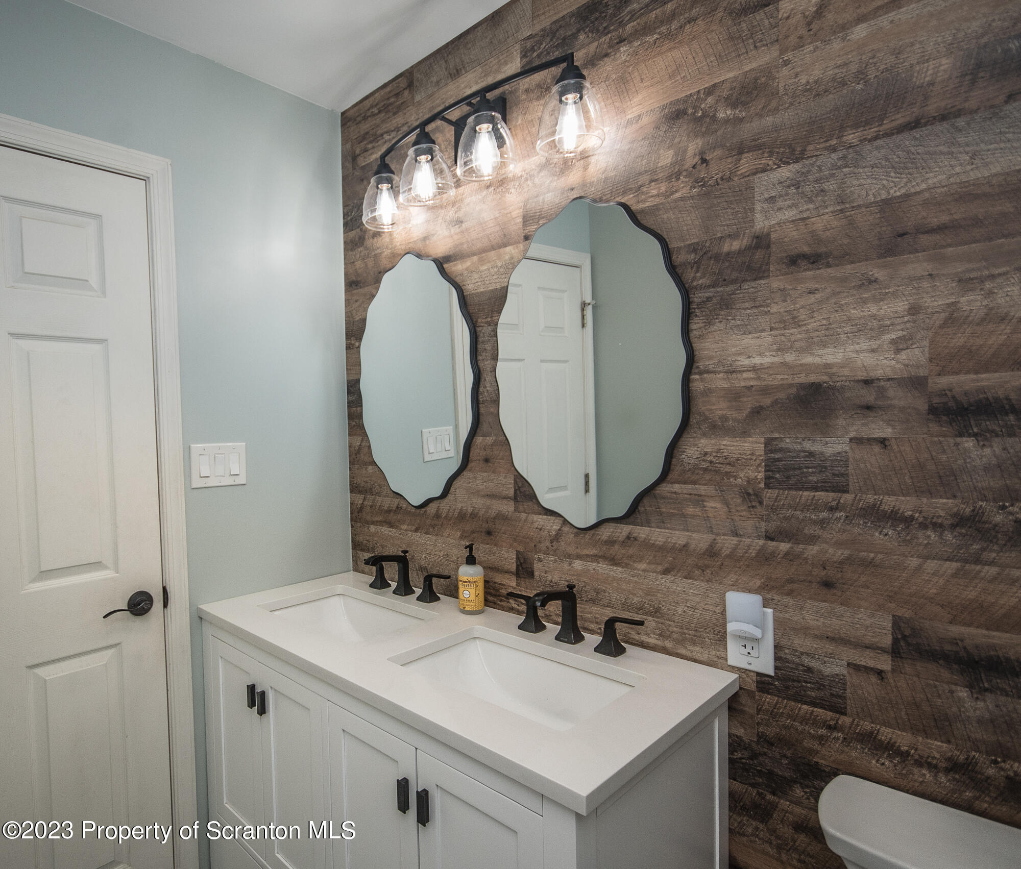 34 Blackberry Hill Road Moscow, PA 18444 - Photo 37 of 43 a bathroom with a sink and a mirror