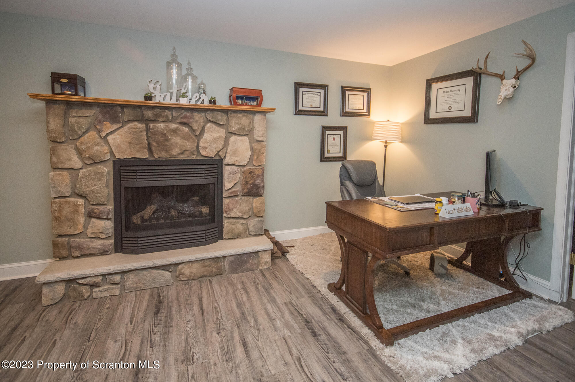 34 Blackberry Hill Road Moscow, PA 18444 - Photo 39 of 43 a living room with furniture and a fireplace