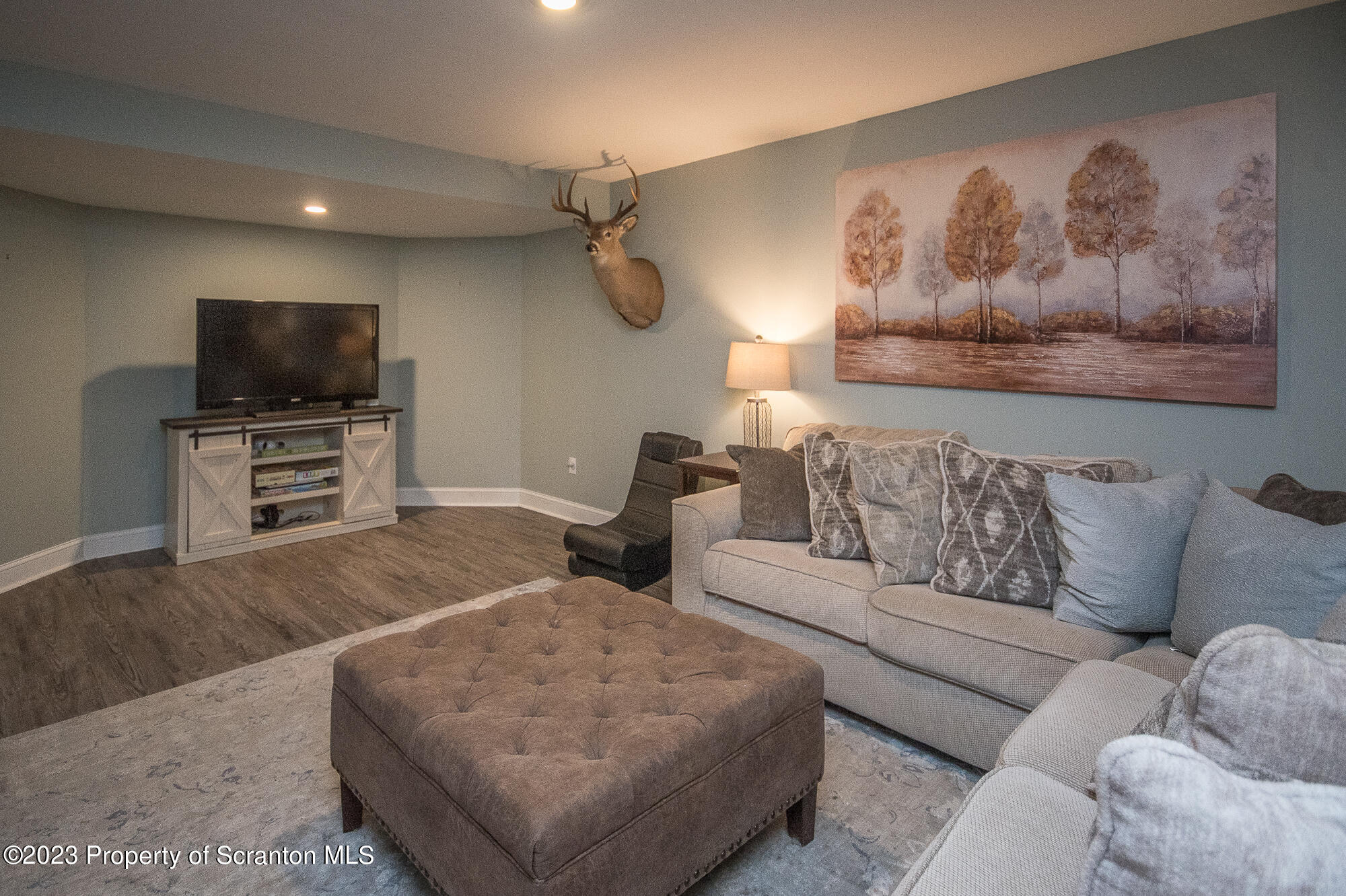 34 Blackberry Hill Road Moscow, PA 18444 - Photo 41 of 43 a living room with furniture and a flat screen tv