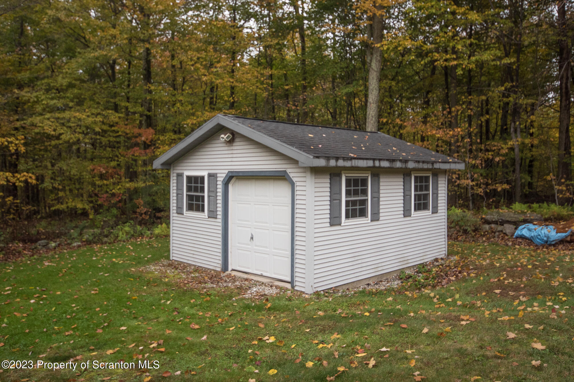 34 Blackberry Hill Road Moscow, PA 18444 - Photo 7 of 43 a front view of a house with a garden