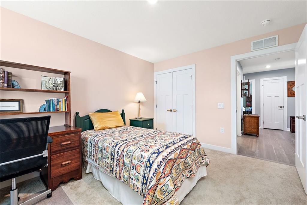 508 Hogan Drive Monroeville, PA 15146 - Photo 14 of 26 a bedroom with a bed and dresser